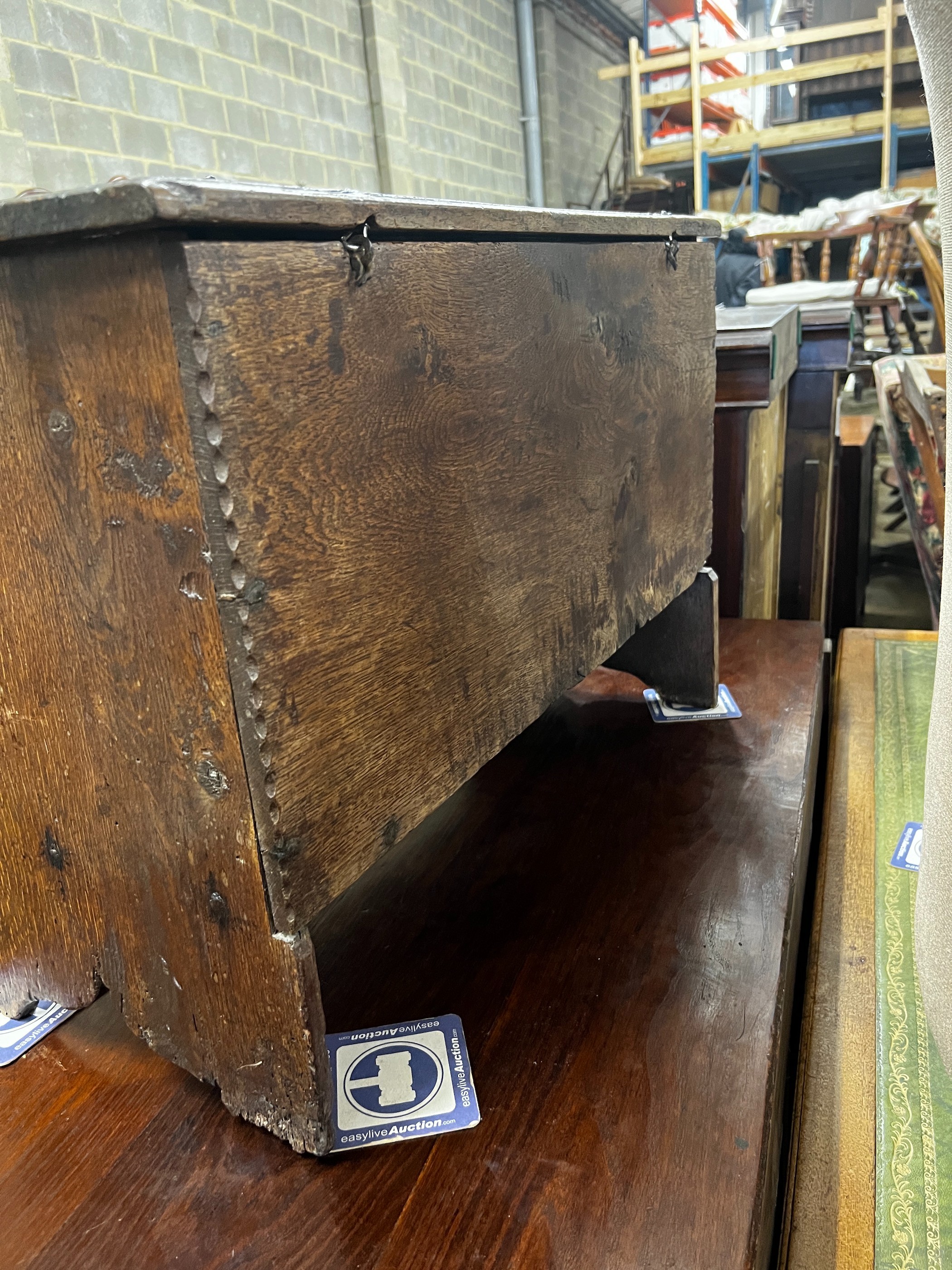 A late 17th century oak six plank coffer, length 73cm, depth 35cm, height 50cm